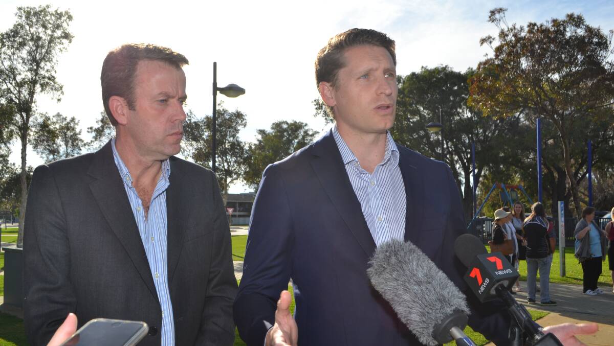 Funding commitment: Social Services Minister Dan Tehan and Canning MP Andrew Hastie at the Mandurah foreshore for the $10m announcement in May. Photo: Amy Martin. 