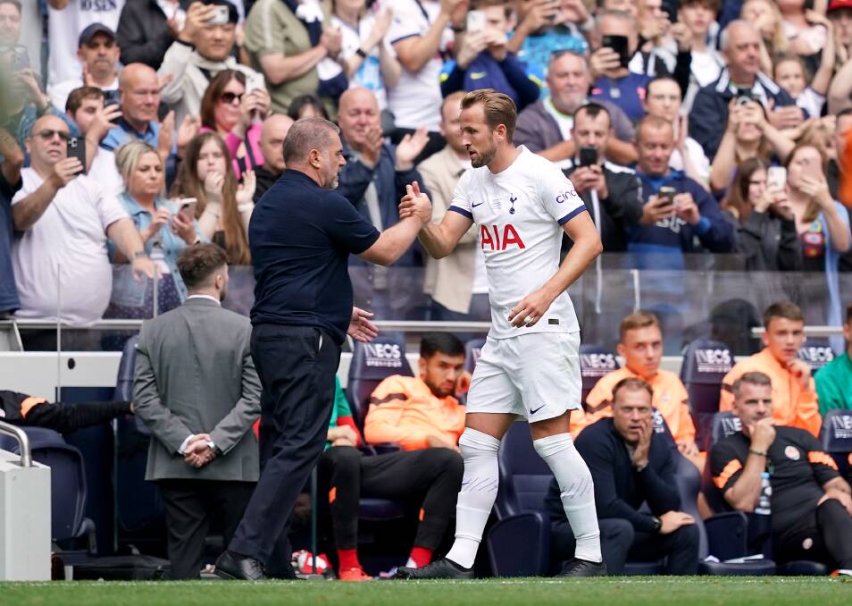 Tottenham's Harry Kane with manager Ange Postecoglou after being substituted during a pre-season friendly on Sunday. Picture Gettys