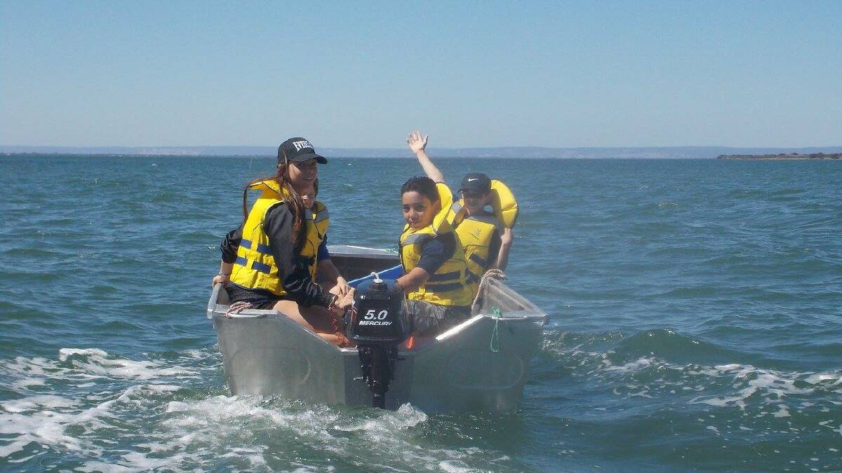 John Tonkin surf science students take charge of the tiller on the leadership program. Photos: Facebook.