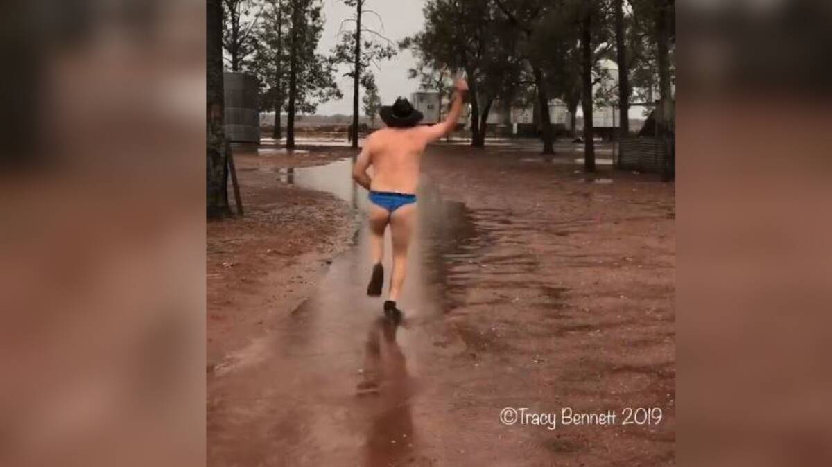 Tracy Bennett's video of her hubbie Rick celebrating top rain at their drought-hit farm at Tottenham.