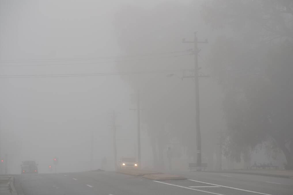 Thick fog along Pinjarra Road on Wednesday morning. Photo: Caitlyn Rintoul. 