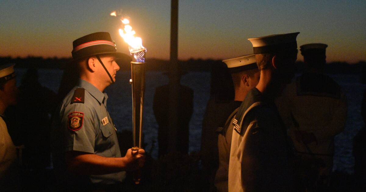 A single flame was the only light on display throughout the dawn service. 
