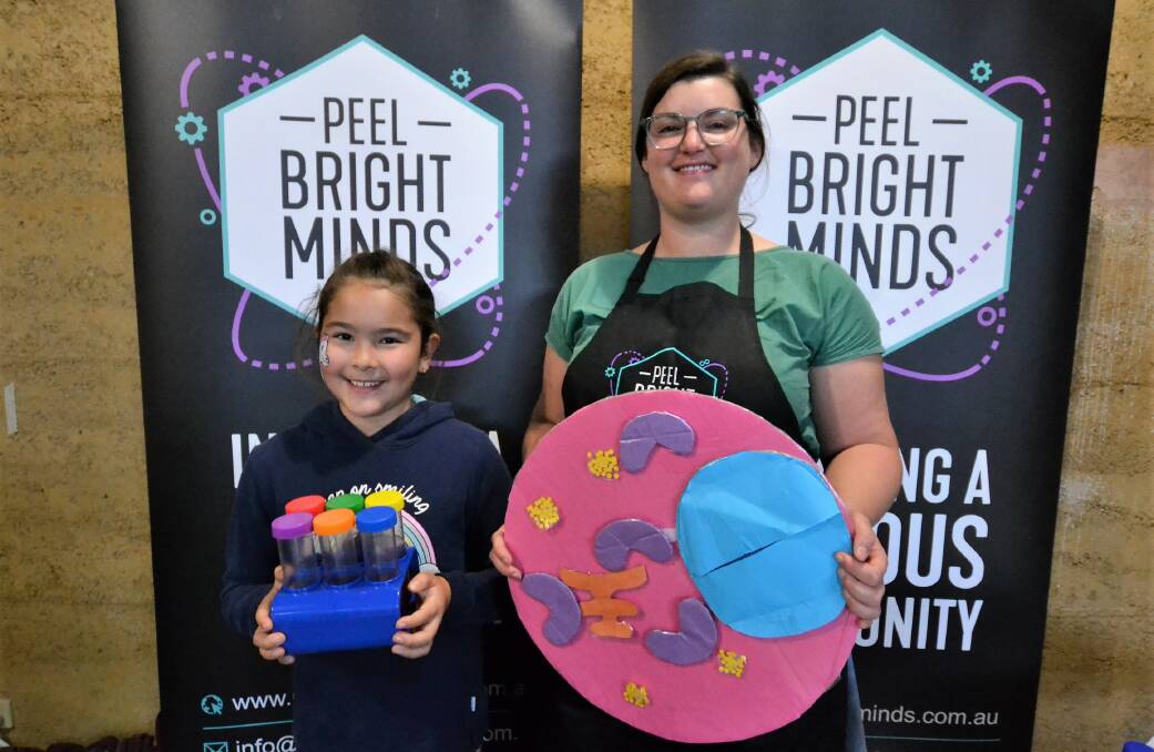 Teaching young minds: Peel Bright Minds program coordinator Charlie Jones with Jessica Scott, who was learning about robotics and the genetics of a strawberry at the SJ Food & Farm Fest on May 5. Photo: Caitlyn Rintoul. 