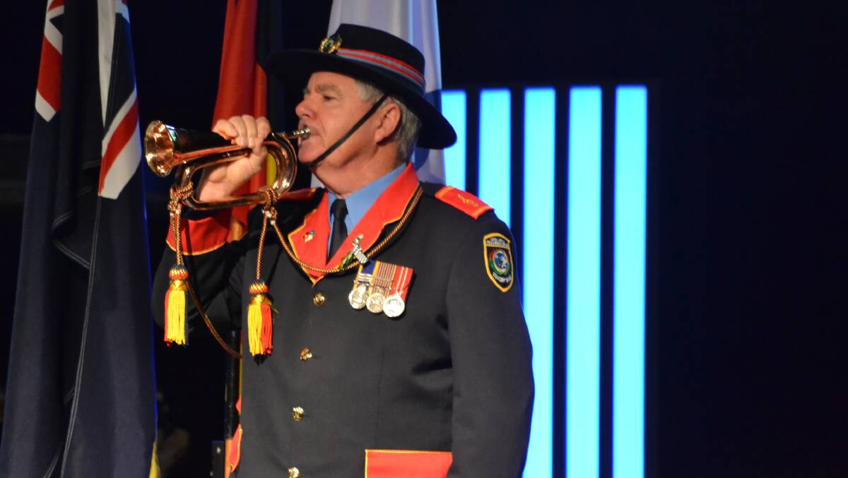 Bugler Ted Tait performing the last post. Photo: Caitlyn Rintoul. 