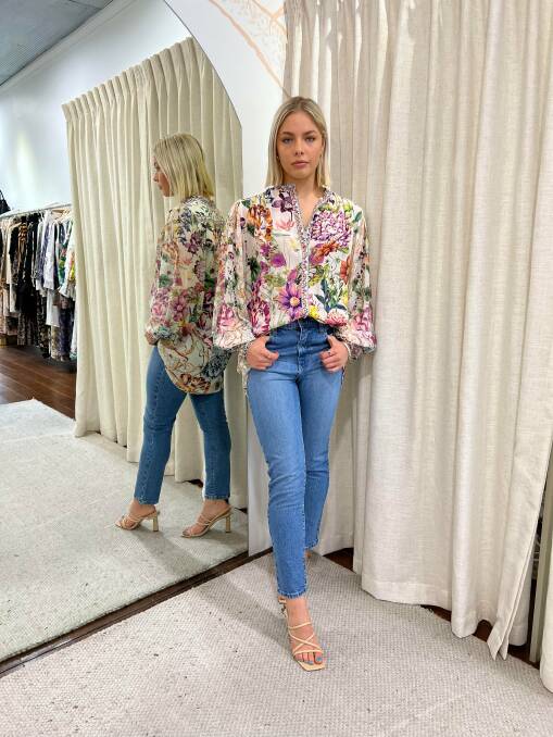 South-west model Sienna Haffner in Camilla With Love floral top, Nobody Denim jeans, and Sol Sana shoes at Life & Soul Boutique at Bunbury. Picture supplied