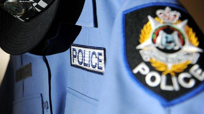 A man spotted with a replica pistol in central Mandurah on Tuesday morning has been taken into custody.