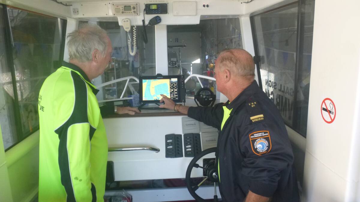 Mandurah volunteers John Morrissey and Des Keen familiarising themselves with the new
equipment on Charles B. Photo: Supplied.
