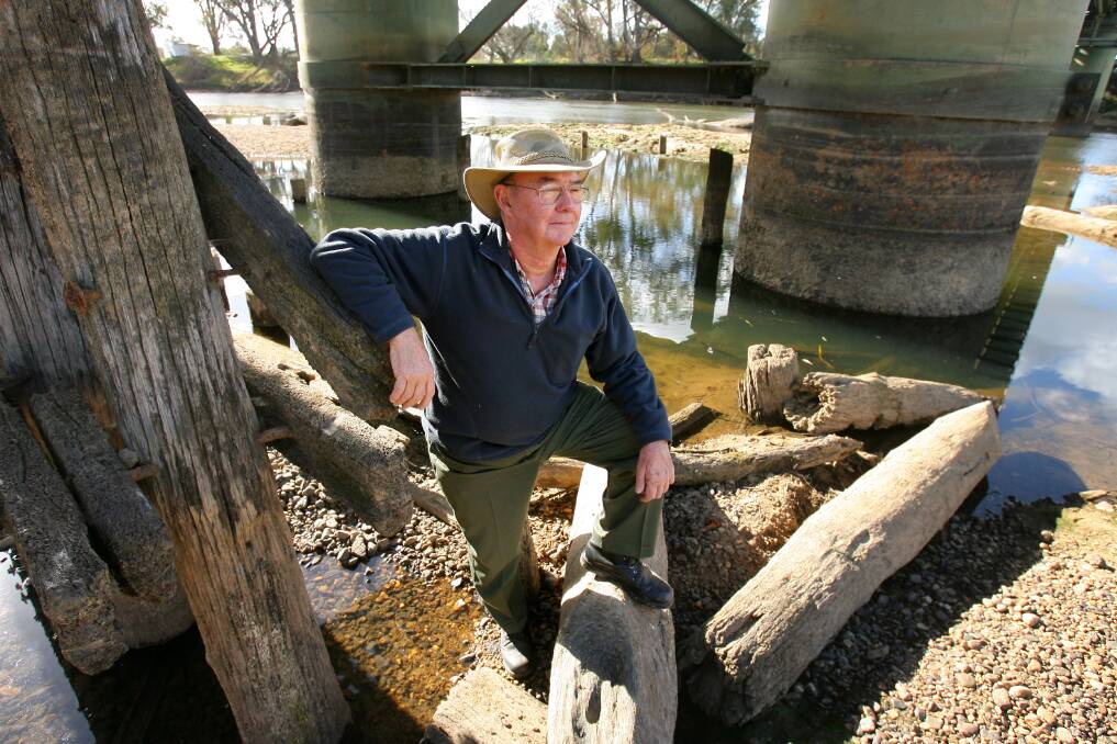Crossing point: Norm Jones on the Murray River which marked the boundary for tackling fruit fly for more than two decades in the 20th century. 