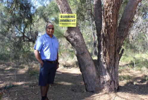 Beware the burn: Aboriginal elder George Walley consulting on the area to be burnt. Photo: supplied.