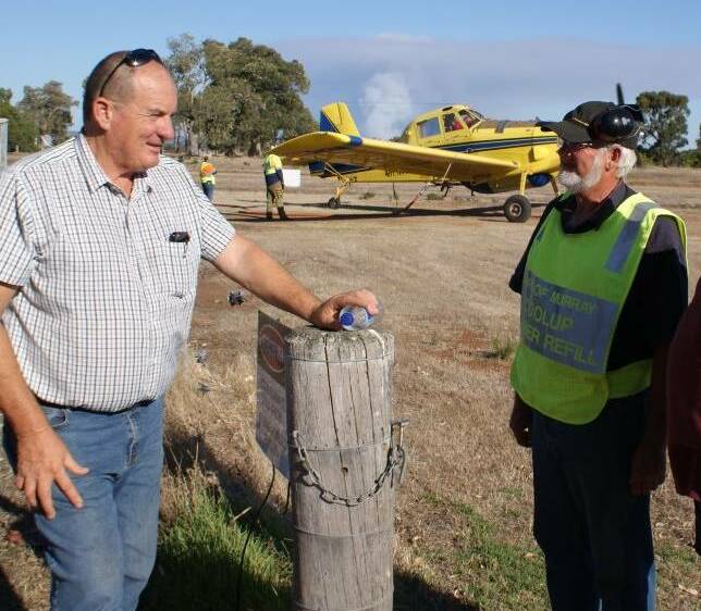 Flight plan: Murray Wellington MP Murray Cowper with Ra Wheeler at Wheelerfield Airfield, which he has proposed as a developed fire response site. Photo: Supplied.