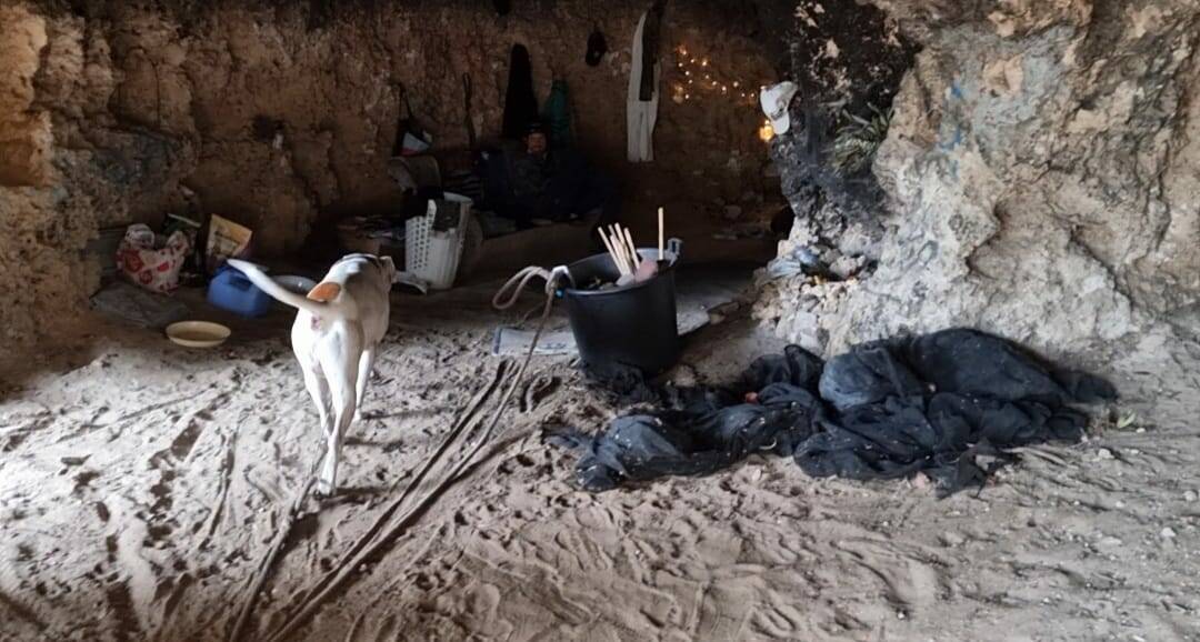 Local Steven Hooper stumbled on a couple living in a decked out cave during one of his adventures. Photo: Supplied.