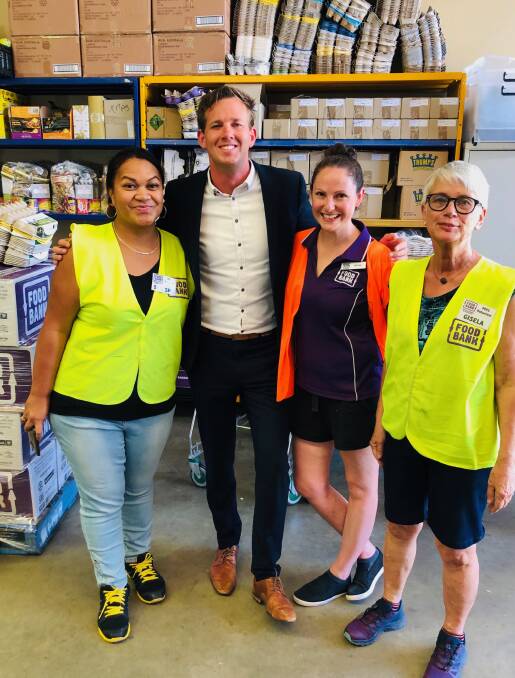 Mandurah mayor Rhys Williams with volunteers at the Peel Foodbank. Picture: Supplied.