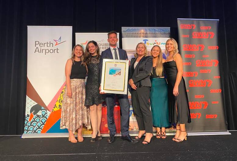 Mayor Rhys Williams and the Visit Mandurah team celebrating the Top Tourism Town win. Picture: Supplied.