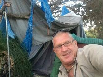 Steve Flavel in front of his tent he called home for seven years.