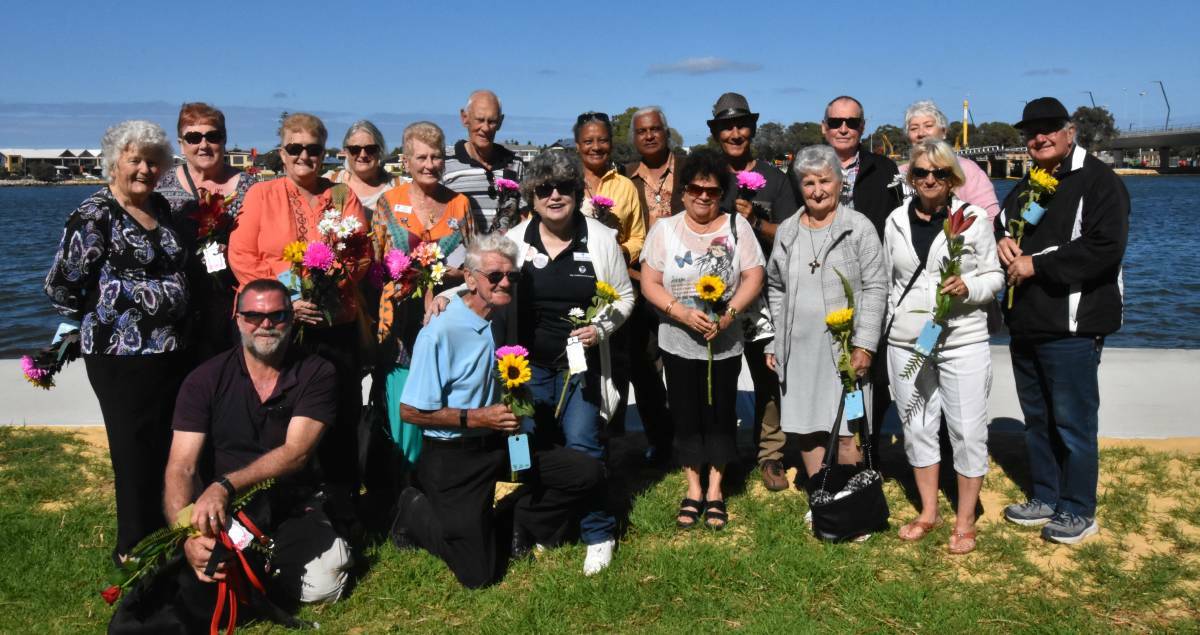Healing: Members from The Compassionate Friends who met in Mandurah for a past Flowers on the Water ceremony.