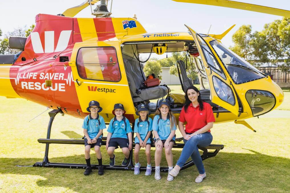 Rescue helicopter and crew land at Comet Bay Primary School