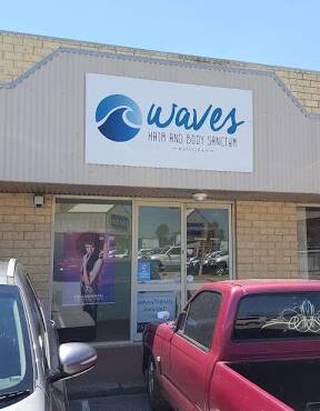 Waves Hair and Body Sanctum owner Ashleigh Brooks said many clients have cancelled amid coronavirus uncertainty. Photo: Supplied.