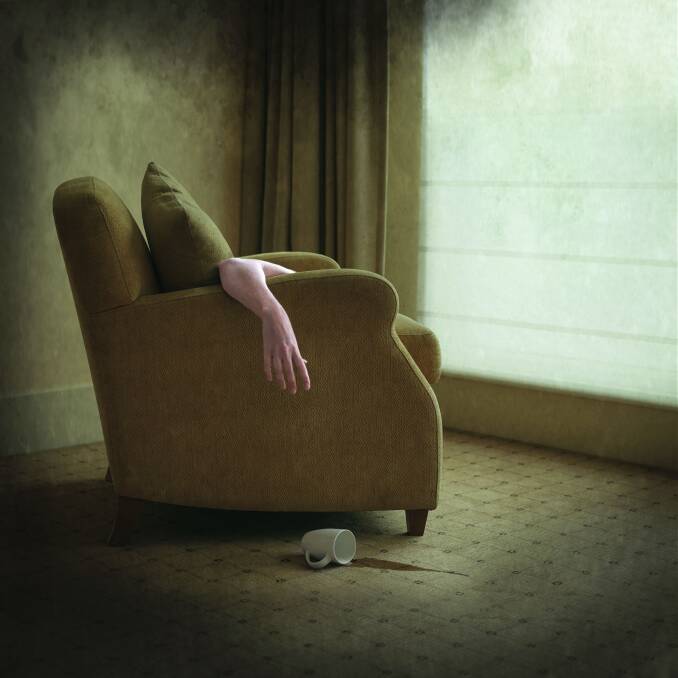 Louise's award-winning photograph, 'Beige Chair' was inspired by the idea of not wanting to be seen. Photo: Supplied.