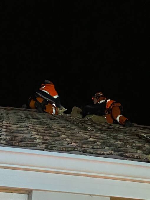SES volunteers fixing a roof in Mandurah. Picture: Supplied.