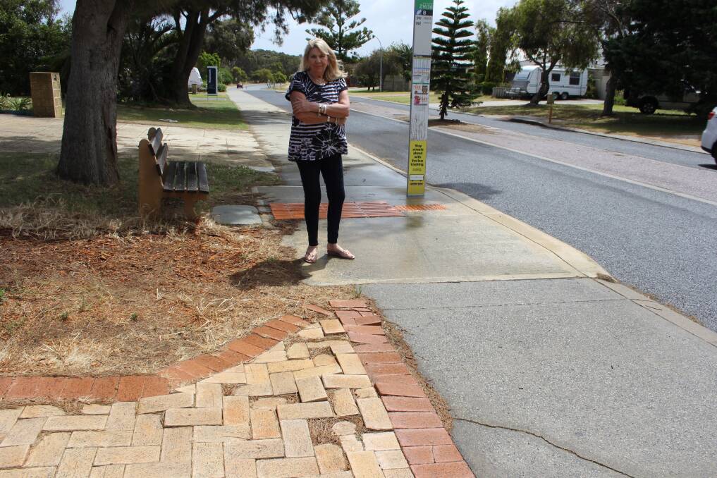Frustration: Halls Head resident Karen Sanders says her paving has lifted for the third time due to tree roots. Photo: Claire Sadler.