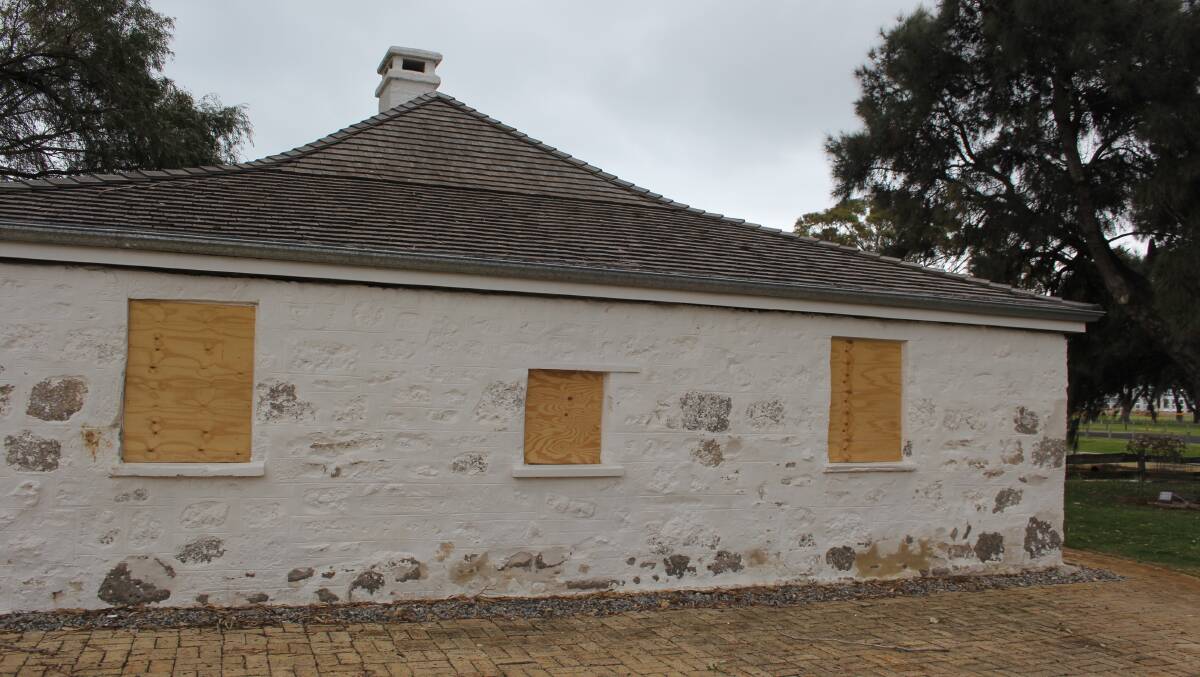 A vandal has left the heritage listed Hall's Cottage with shattered glass windows, damaged limestone walls, and broken furniture. Photos: Claire Sadler.