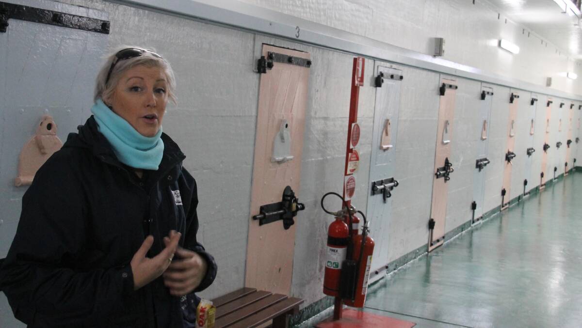 Life inside: Bec Burgess guiding me past some of the cells at Maitland Gaol.