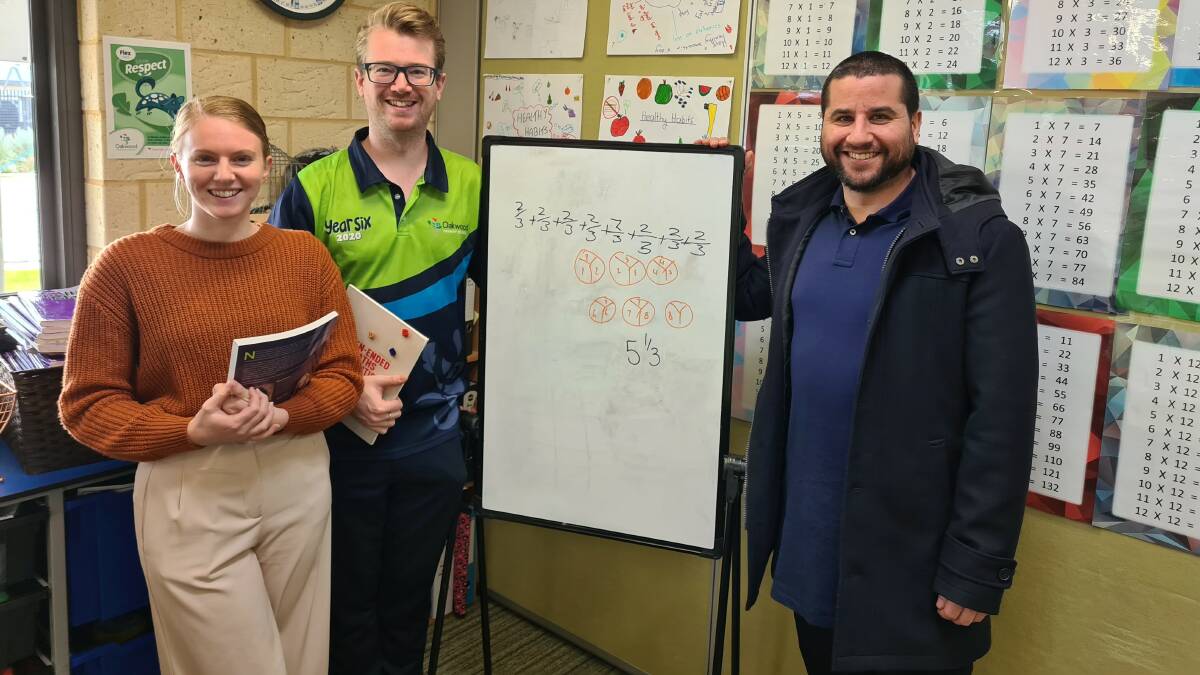 Oakwood Primary School teachers Rebecca Johns and Karl Schoeppner with Scitech coordinator Shyam Drury. Photo: Supplied.