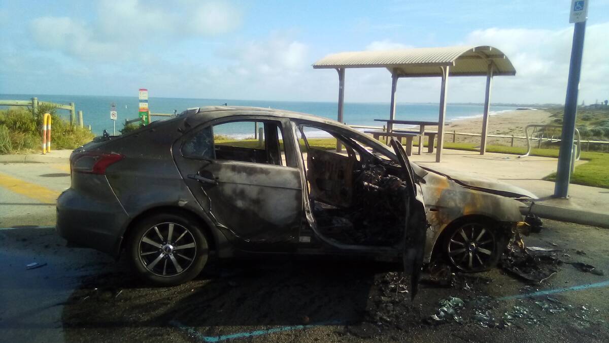 Phillip Jones photographed this car which was burnt down at the Silver Sands Beach car park on Saturday. Send your photos to editor@mandurahmail.com.au