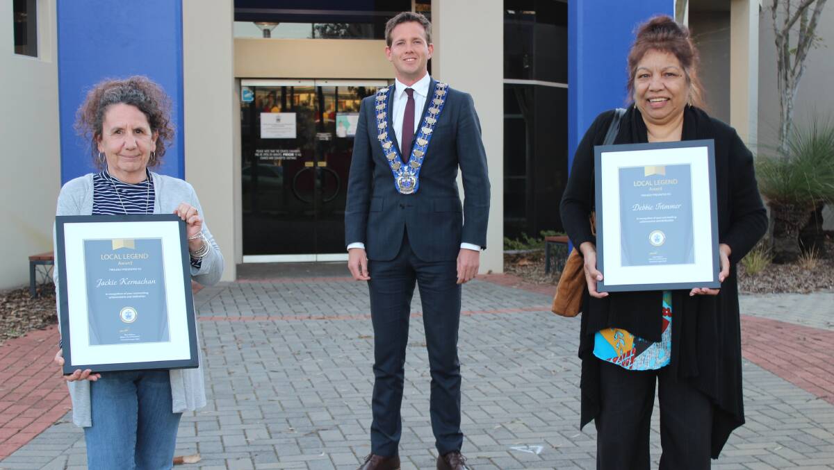 DEDICATION: Debbie Trimmer and Jackie Kernachan were recognised by Mayor Rhys Williams (centre) for their dedication to helping people experiencing homelessness.
