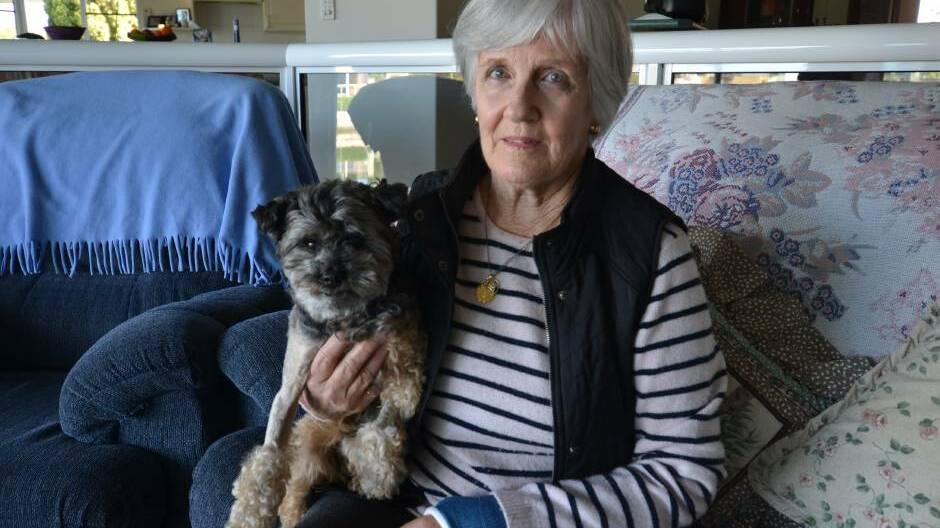 Eileen Beitmanas suffered a broken arm after she was knocked over by a dog that mauled her dog Milo in June last year. 