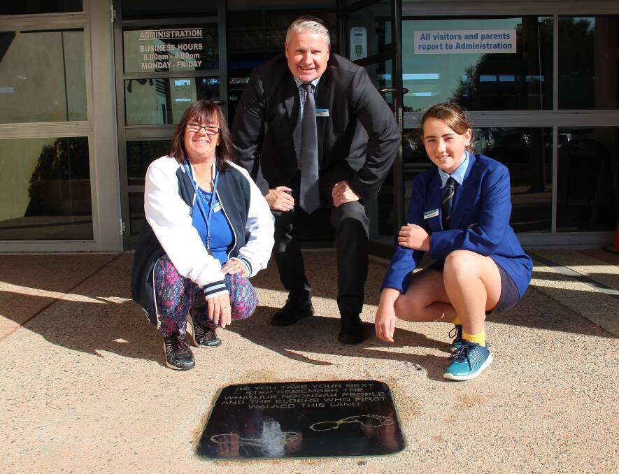 Plaque: Comet Bay College Aboriginal and Islander Education Officer Lee-Ann Hay, Principal Jamie Hayres and Year 8 student Shaylah Arthurson at the official unveiling of school's new plaque, acknowledging the Whadjuk Noongar people as the traditional custodians of the land.