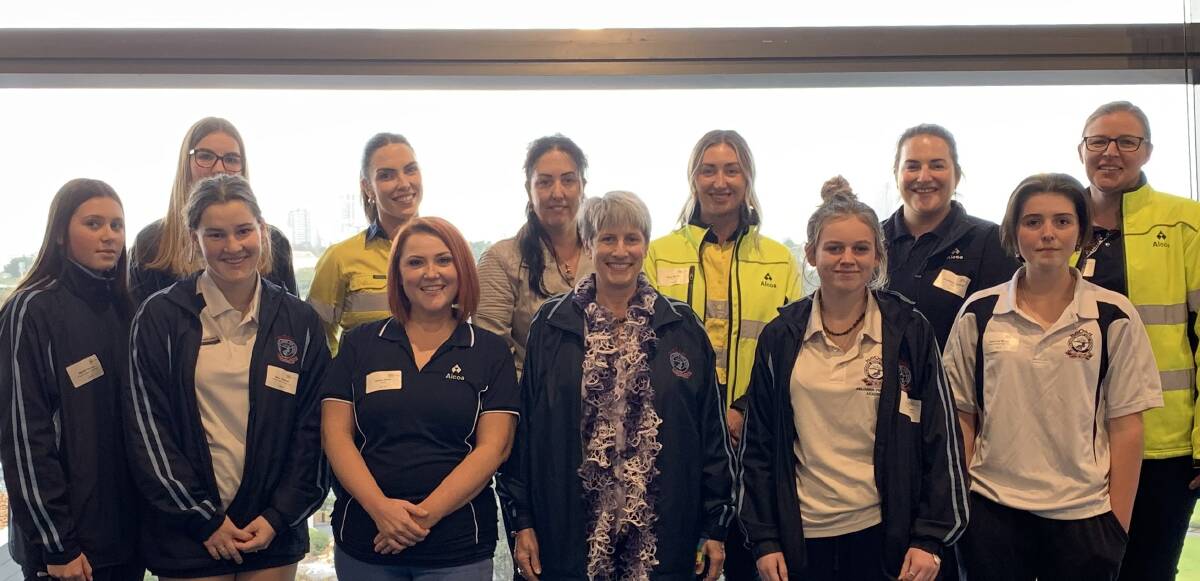 ENTOURAGE: Front row: Madison Hemopo (PSHS), Bella Chalwell (PSHS), Amber-Rose White (Huntly mine), Julie Gray (Pinjarra Senior High School Career Practitioner), Charlize Brookman (PSHS) and Amy-Lee Moody (PSHS). Back row: Kyah McShane (PSHS) and Mikaela Bell, Karen McGhee, Alana Morris, Stephanie Gardner and Jane McIntyre (all from Pinjarra refinery). Picture: Supplied.