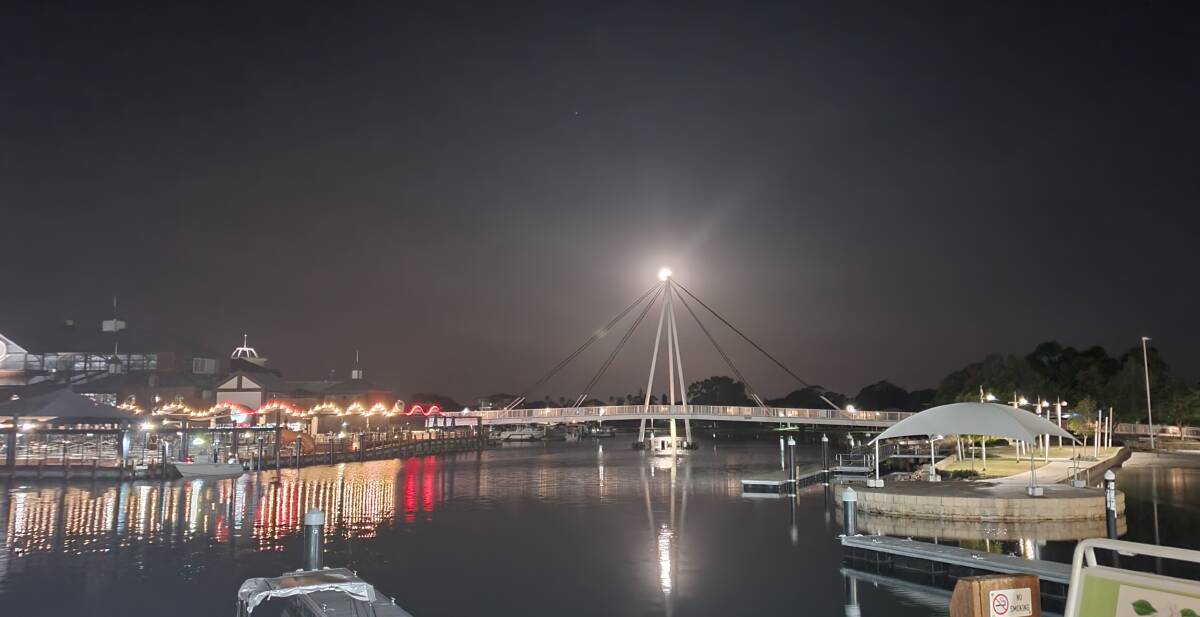 Pat Bourne sent in this photo of the moon rising over Dolphin Quay. Send your photo to editor@mandurahmail.com.au