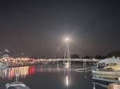 Pat Bourne sent in this photo of the moon rising over Dolphin Quay. Send your photo to editor@mandurahmail.com.au