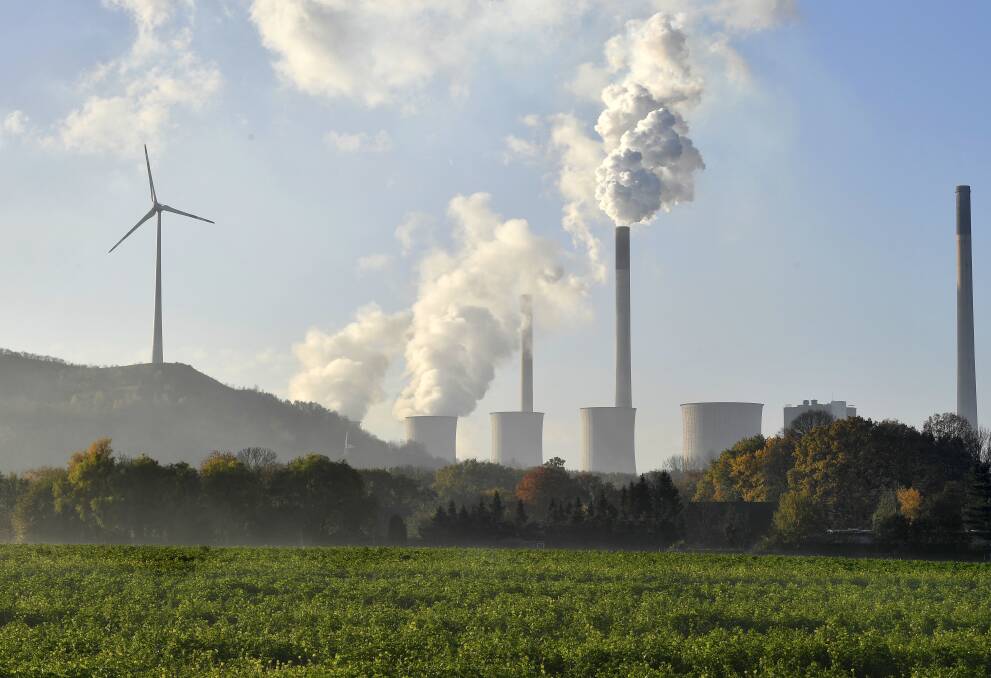 A coal-burning power plant steams in Gelsenkirchen, Germany. Picture: AP