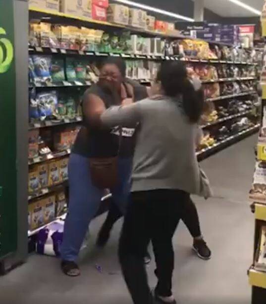 Footage of women allegedly fighting over toilet paper at Woolworths. Picture: Channel Nine