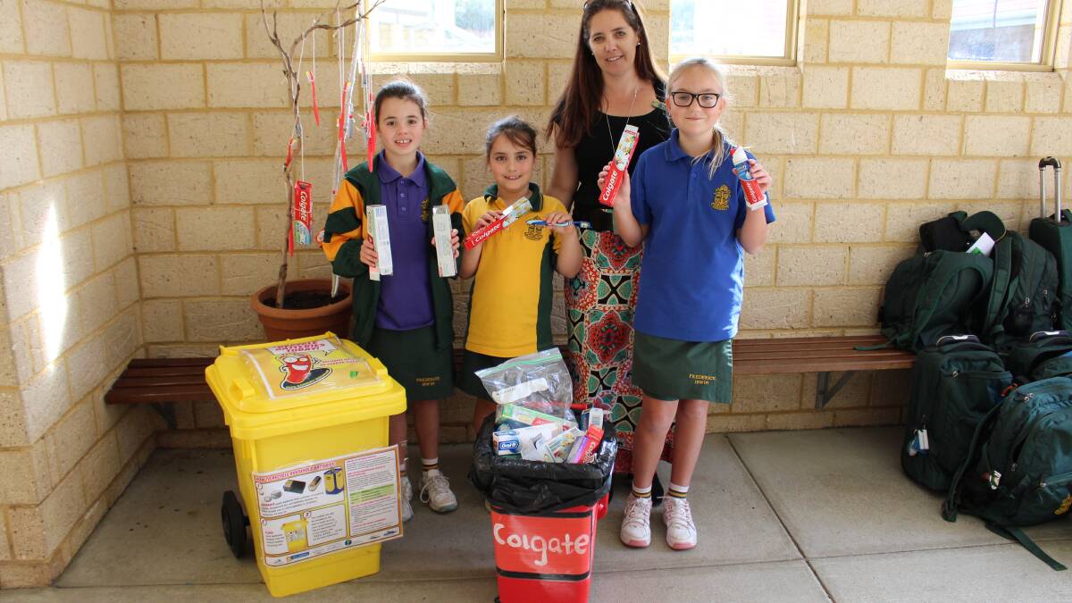 Recycling drive: Meadow Springs Campus Primary School students Lucy Pedder-Newman, Freya Hunter and Emily Van Breda with teacher Mrs Katrina Wade. Photo: Supplied