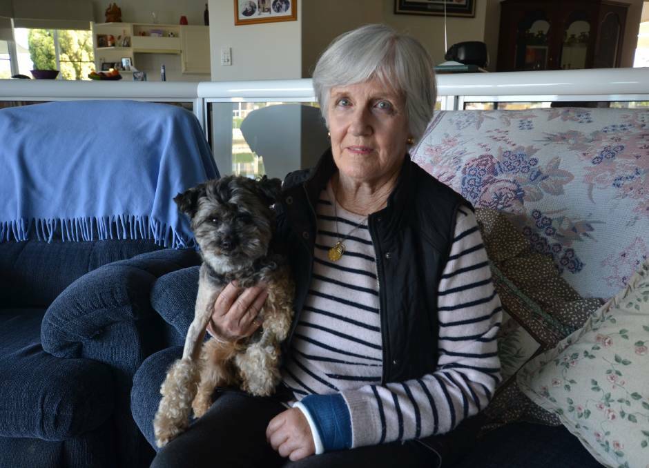 Eileen Beitmanas suffered a broken arm after she was knocked over by a dog that mauled her dog Milo.
