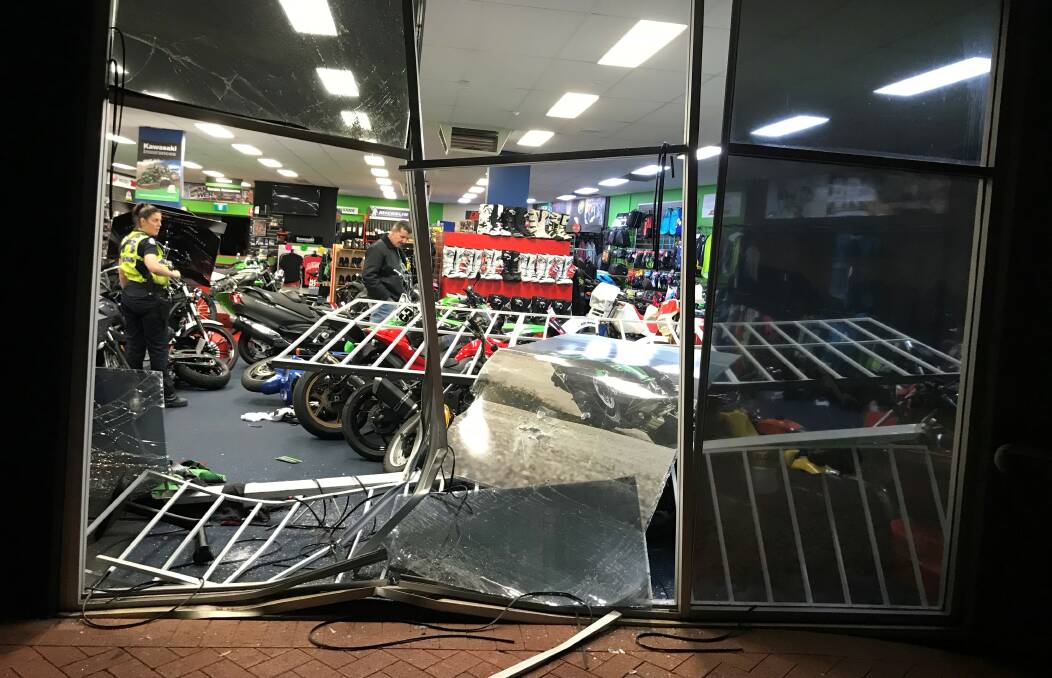 Damage: A vehicle was used to break the shop front of the Mandurah business. Photo: Paul Mansfield.