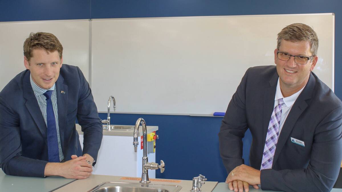 Federal funding: Canning MP Andrew Hastie and Austin Cove Baptist College principal Paul Venter. Four Peel schools will benefit from the latest round of funding. Photo: Supplied.