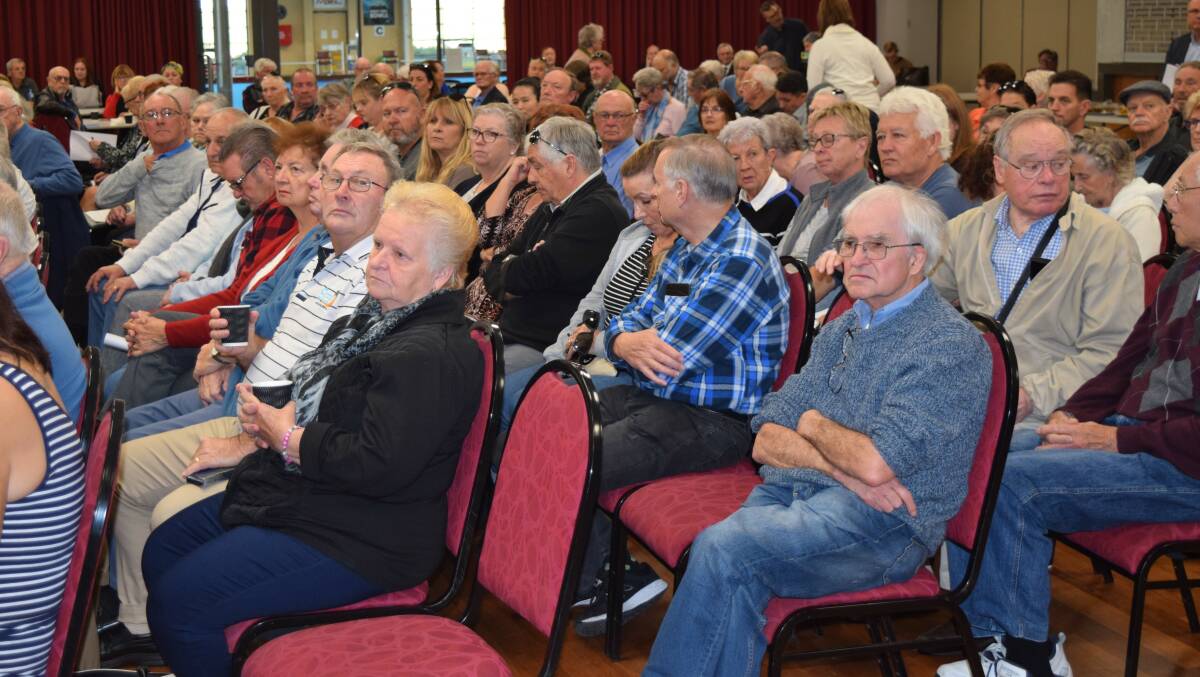 Worried faces: About 100 residents whose life savings are at risk met in Mandurah last Friday. Photos: Carla Hildebrandt.
