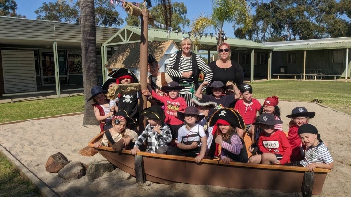 All Aboard: The new Treasure Island playground at Carcoola Primary School has been a hit with kids. Photo: Supplied.