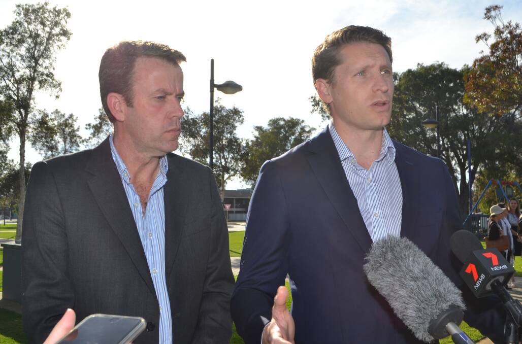 Funding commitment: Social Services Minister Dan Tehan and Canning MP Andrew Hastie at the Mandurah foreshore for the announcement on Wednesday morning. Photo: Amy Martin. 