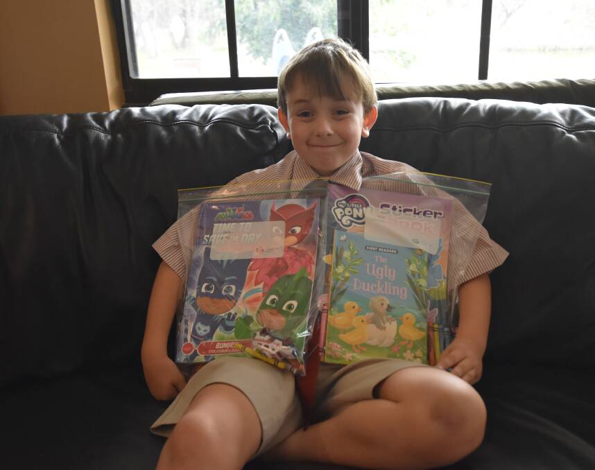 Nine-year-old Connor Standen is helping to bring smiles to the faces of children in hospital, delivering packages of colouring and reading books, crayons and toys. Photo: Kaylee Meerton.