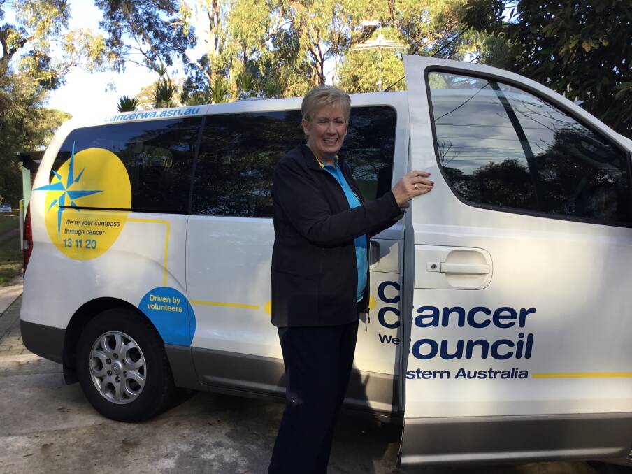 Brenda Kirkwood with a van used in the Peel region's Transport to Treatment program. Photo: Supplied.