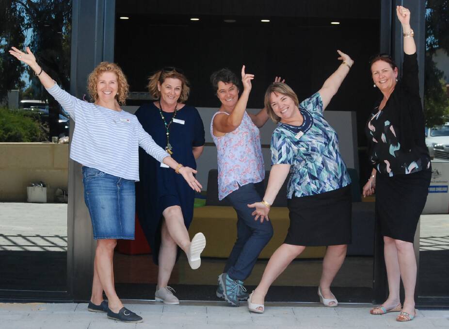 Palmerston's Raylene Catterick, GP Down South's Anne Walsh, GP Down South's Eleanor Britton, Peel Youth Medical Service's Denise Puddick and GP Down South's Tammy Levey celebrate moving into the Peel Health Hub. Photo: Kaylee Meerton.