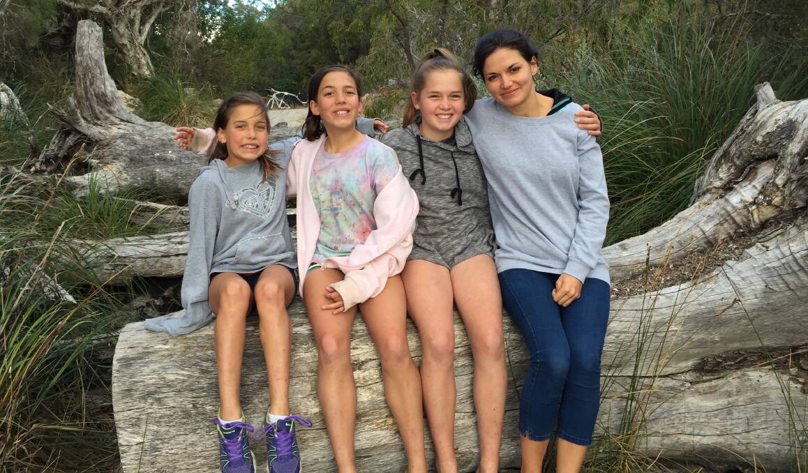 Kiara Fitze (second right) with mum Miriam (far right) and sisters Melody and Tzuriya. Photo: Supplied. 