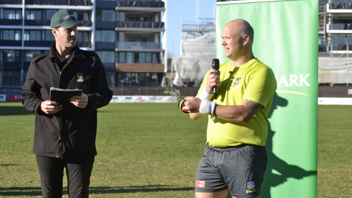 Peel's Adam Hauswirth accepts the JJ Lussick award after being named best umpire at the Landmark Country Football Championships. Photo: Tom Munday.    