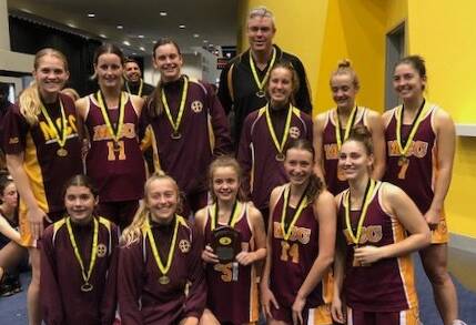 The Mandurah Catholic College's First V girls basketball squad made it back-to-back titles. Photo: Supplied.