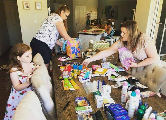 The Carey family held a packing day to organise the donations. Photo: Supplied.